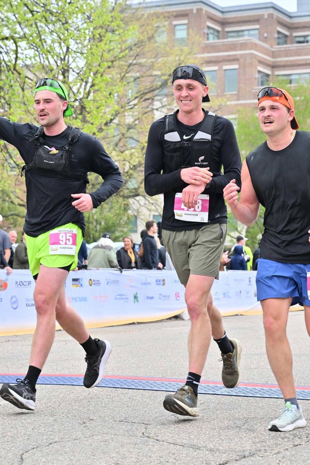Nick and Nate finishing their first marathon together